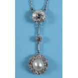 An Edwardian pearl and diamond necklace, the central section with a large old brilliant cut