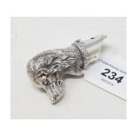 A novelty silver whistle, in the form of a dog's head Report by NG Modern