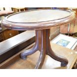 A mahogany oval wine cooler stand, on four splay feet with scroll toes, 76 cm wide