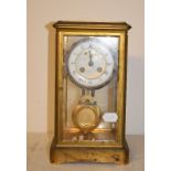 A four glass clock, the 9.5 cm diameter enamel dial, signed Charles Ouidin, Palais Royal, Paris, the