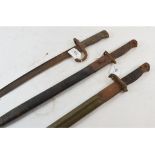 Two bayonets and scabbards, and another bayonet (3)