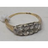 An 18ct gold diamond cluster ring, set ten old brilliant cut stones, approx. ring size N Report by