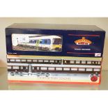 A Hornby 00 gauge train pack, The Royal Train Coaches, 2918-2920, and a Bachmann 00 gauge 166