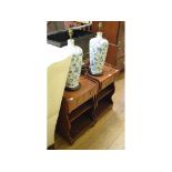 A pair of mahogany bedside tables, 41 cm wide and a pair of lamps (4)