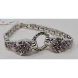 A silver panther bracelet, set marcasites and rubies Report by NG Modern