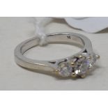 A 9ct white gold and three stone diamond ring, approx. ring size J Report by NG It is approx. 2.9