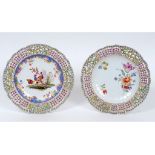 A Meissen porcelain plate, with pierced and applied floral decoration, the centre painted birds,