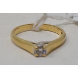 An 18ct gold and solitaire diamond ring, approx. ring size L½ Report by NG It is approx. 3.1 g (