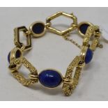 A 9ct gold and lapis Lazuli bracelet, approx. 32.6 g (all in) Report by RB With the safety chain