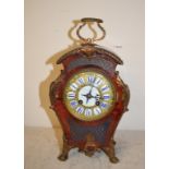 A Louis XVI style mantel clock, the 8 cm diameter dial signed Goldsmiths Company, Regent Street,