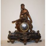 A late Victorian mantel clock, the 9 cm diameter black dial with Roman numerals, in a black marble