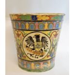 A large Continental majolica jardiniere, of tapering cylindrical form, decorated heraldic motifs, 39