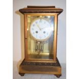 A four glass clock, the 10 cm enamel dial with Arabric numerals, fitted an eight day movement,