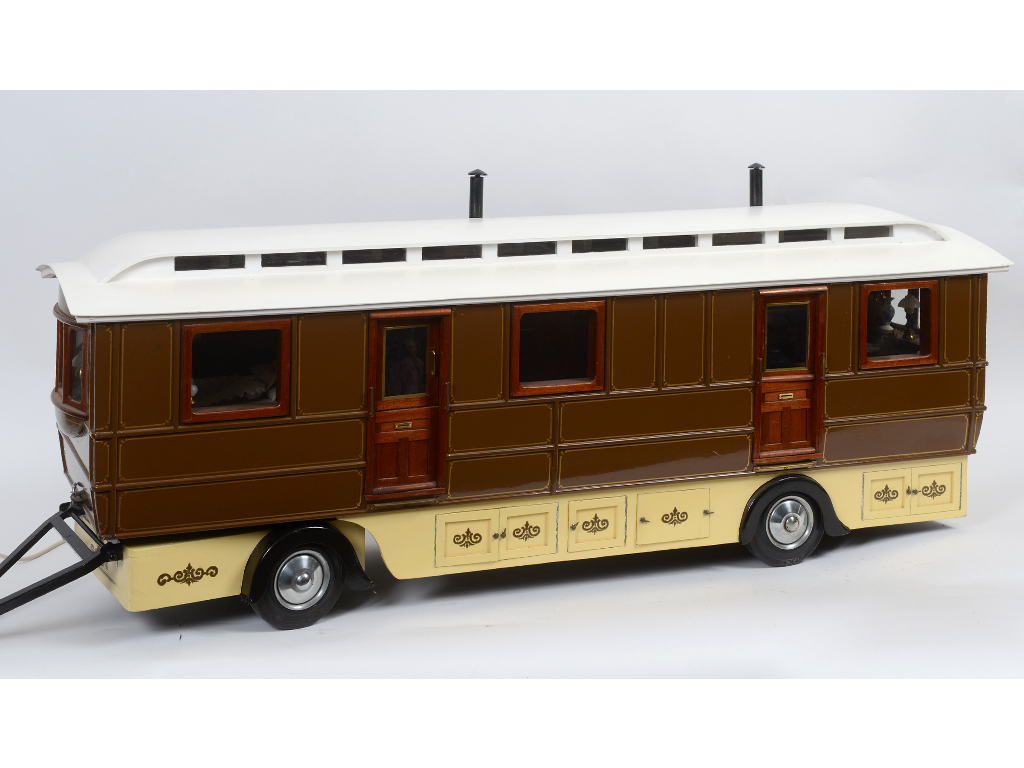 A scratch built showman's travelling caravan, with fitted interior, furnishings and painted