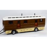 A scratch built showman's travelling caravan, with fitted interior, furnishings and painted