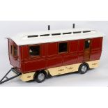 A scratch built showman's travelling caravan, with fitted interior, furnishings and painted