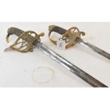 A Victorian sword, the brass guard with VR cypher, and another similar (2)