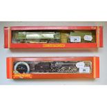 A Hornby 00 gauge locomotive and tender, 2-10-0, BR Class 9F, R264, and another, R866, both boxed (