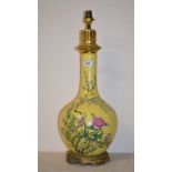 A Chinese vase, decorated prunus on a yellow ground, converted to table lamp, 68 cm high (