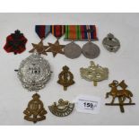 Assorted military badges, and other items