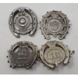 A silver horseshoe sweetheart brooch, RMLI, Birmingham 1918, another, ASC, and two others (4)