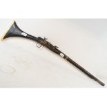 A 19th century Indian flintlock rifle, probably for a child, the octagonal barrel with gilt and