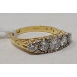 An 18ct gold and five stone diamond ring, approx. ring size O See illustration report by NG