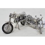 A novelty silver motorcycle, and another similar (2) Report by NG Modern