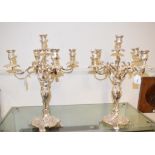 A pair of plated Rococo style five light candelabra, 48 cm high (2) Report by RB Modern