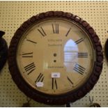 A wall clock, the 33 cm diameter painted dial with Roman numerals, fitted a single fusee movement,