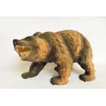 A Black Forest style carved wood grizzly bear, 38 cm wide