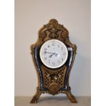 A large French mantel clock, the 19.5 cm diameter enamel dial with Arabic numerals, in an ebonised