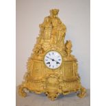 A 19th century French mantel clock, the 7.5 cm diameter enamel dial with Roman numerals, fitted an