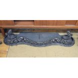 A Victorian cast iron fire surround, of shaped form with pierced floral and foliate decoration,