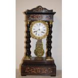 A late 19th century French portico clock, the 8.5 cm enamel dial with Roman numerals, fitted an