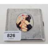 A silver cigarette case, later applied a plaque decorated an erotic lady