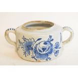 A Dutch Delft two handled pot, decorated flowers, 17 cm wide