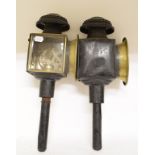A pair of brass and lacquered coaching lamps, 47 cm high