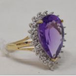 A 9ct gold, pear cut amethyst and diamond cluster ring, approx. ring size K½ Report by NG Modern