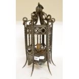 A wrought iron lantern, 22 cm wide