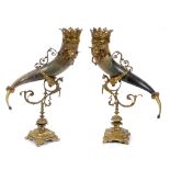 A pair of late 19th century horn cornucopia, with gilt metal mounts decorated mythical winged