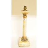 An onyx table lamp, with champleve enamel mounts, 44 cm high (excluding electric fitment)