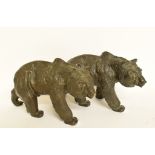 A bronze figure, in the form of a bear walking, 11 cm high, and another matching (2)