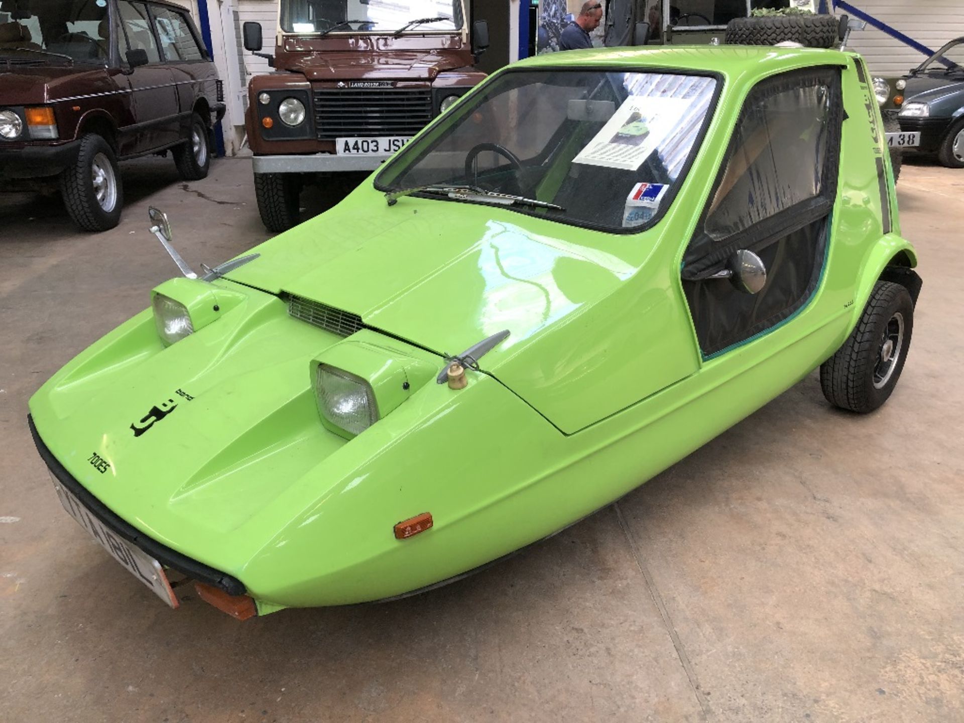 A 1972 Bond Bug 700ES, registration number YTA 181L, chassis number BB61884, Lime green. The