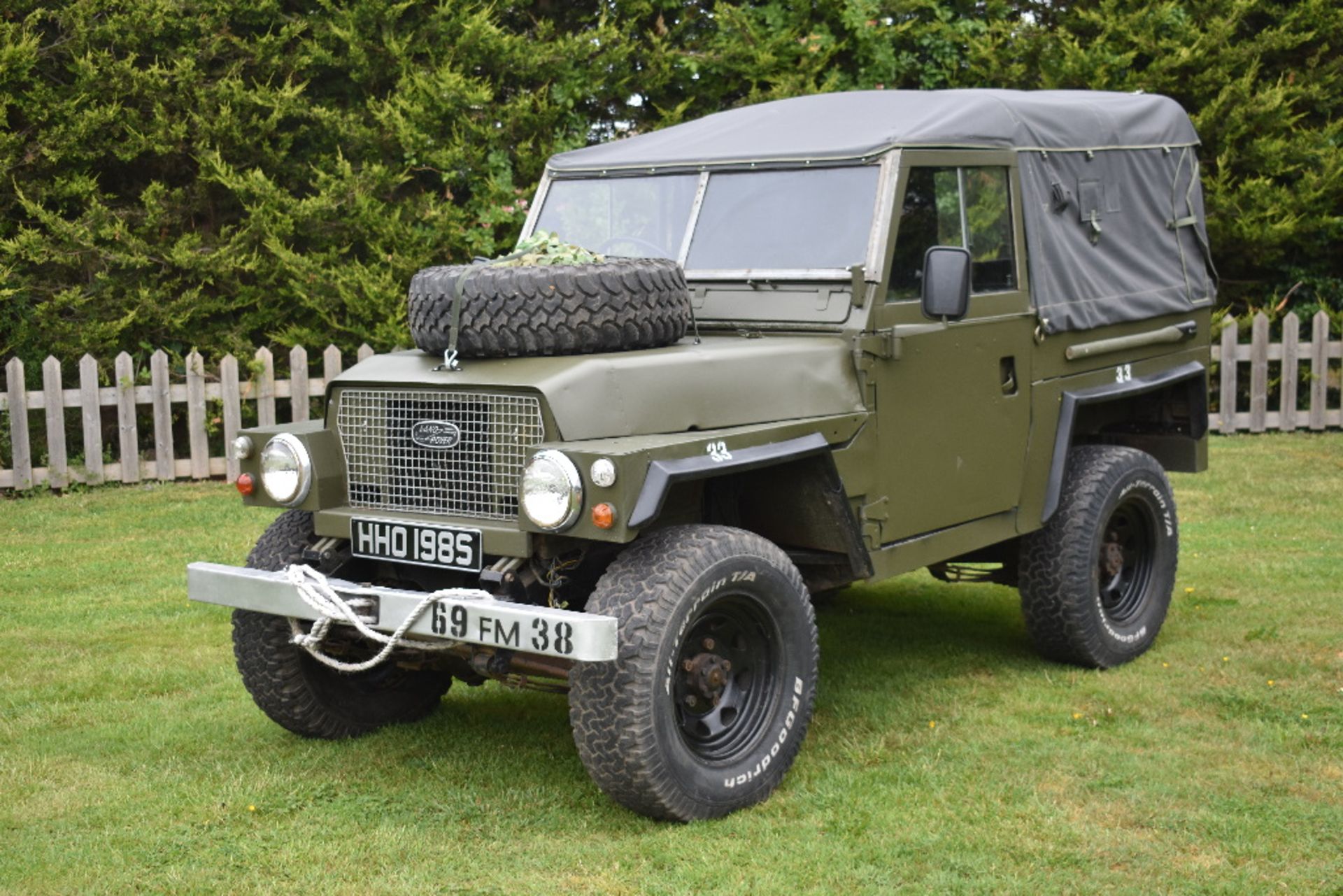 A 1974 Land Rover Series III military lightweight 1/2 ton utility truck, registration number HHO