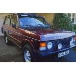 A 1986 left hand drive Range Rover Classic two door, registration number C140 BDL, Burgundy