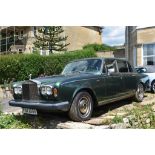 A 1979 Rolls-Royce Silver Wraith II, registration number FOX 655V, green. The Silver Wraith II