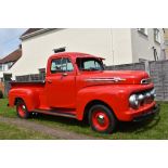 A 1952 Ford F1 Deluxe V8 pickup deluxe, registration number 712 YUU, red. This imposing pickup was