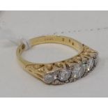 An 18ct gold and five stone diamond ring, approx. ring size O report by NG Approx. 5.1 g (all in)