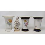 A pair of Meissen porcelain vases, decorated flowers, 16 cm high, another similar and a Meissen
